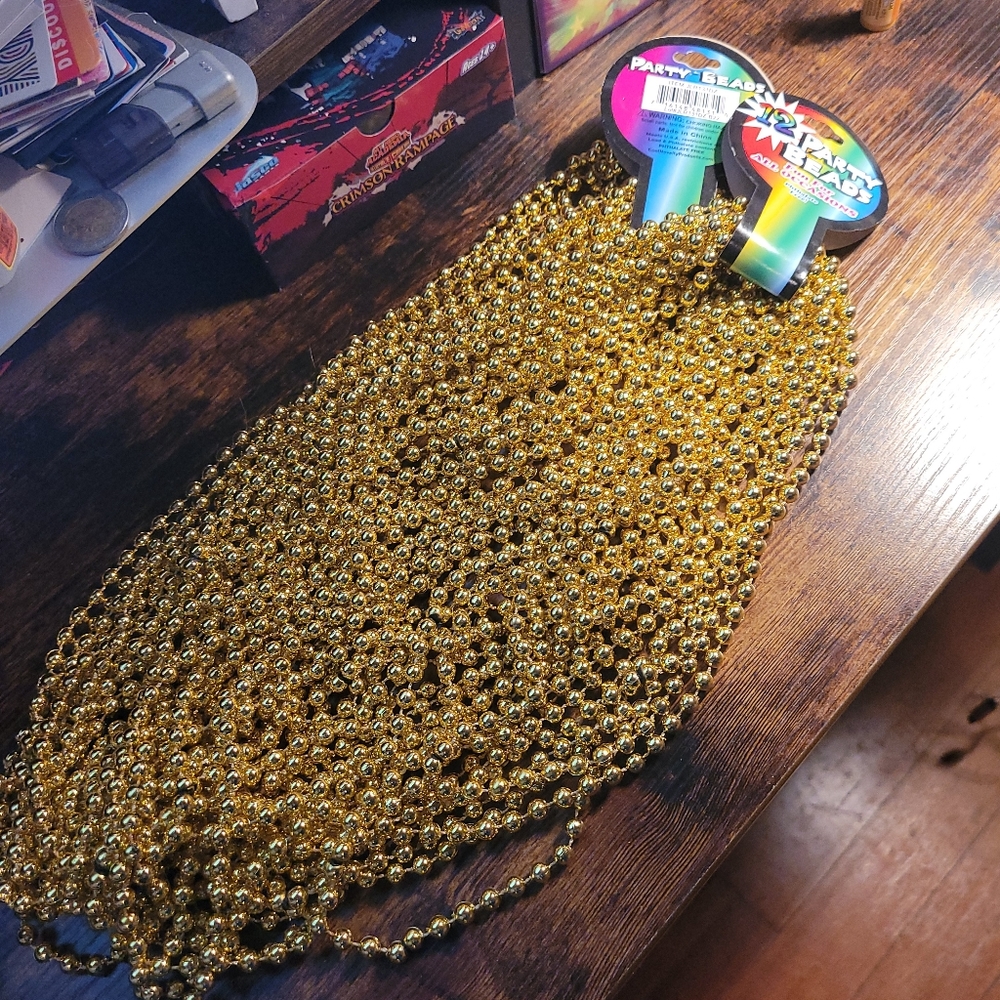30 golden Mardi Gras beads necklaces